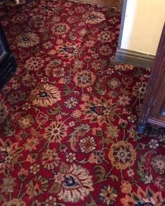 The same carpet cleaned, pattern back to its colour