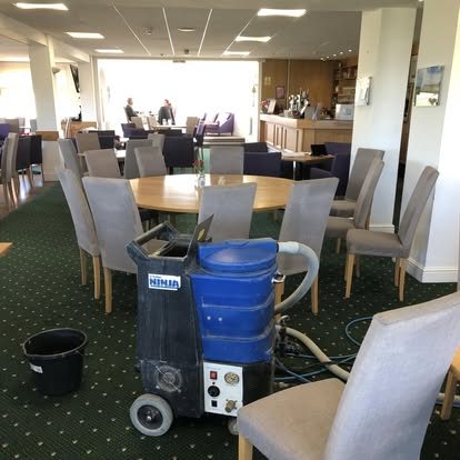 The machine set up in a golf club dining room